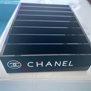 black acrylic compact makeup holder with white letters
